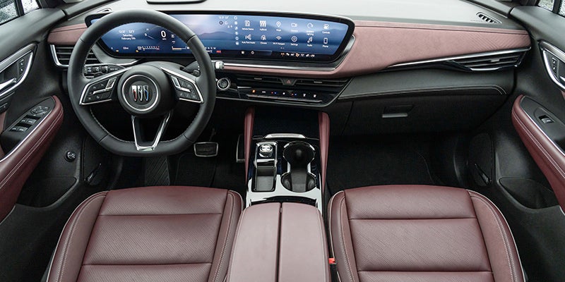 Buick Envision Technology interior featuring curved digital display, premium leather seats, and advanced infotainment system with modern dashboard design
